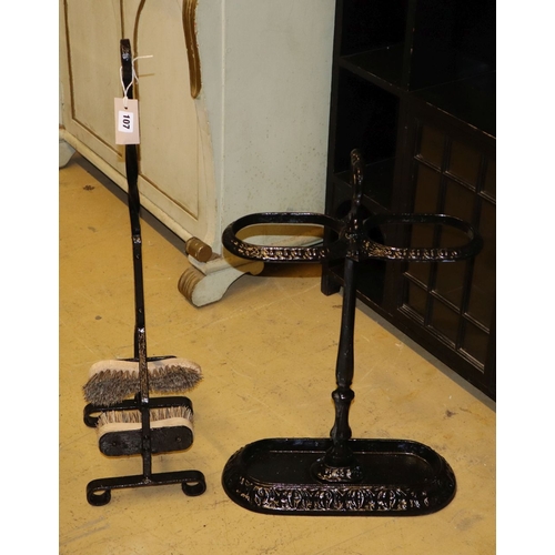 1107 - A painted cast iron stick stand, H.60cm together with a boot brush stand