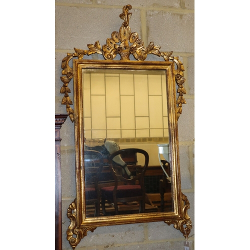 1115 - A giltwood and gesso wall mirror, W.58cm, H.110cm