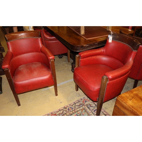 1122 - A set of six mahogany framed tub shaped theatre viewing armchairs, with red leather upholstery (by r... 