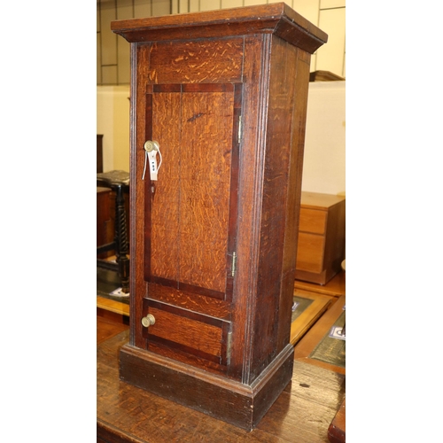 1149 - A 19th century mahogany banded oak pedestal bedside cupboard (converted from a longcase clock case) ... 