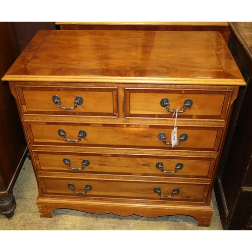 1151 - A small reproduction yew chest, W.66cm, D.41cm, H.73cm