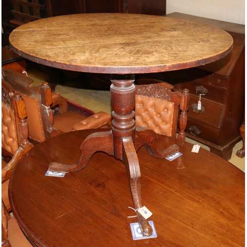 1156 - A 19th century oak circular tripod tea table, diameter 84cm
