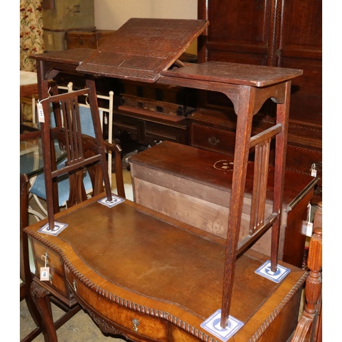 1157 - An Edwardian oak adjustable reading table, W.94cm, D.34cm, H.70cm