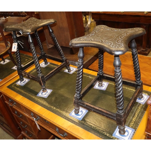 1169 - A pair of late Victorian carved oak stools, W.29cm, H.49cm