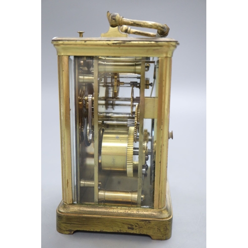 1212 - A brass cased hour repeating carriage clock