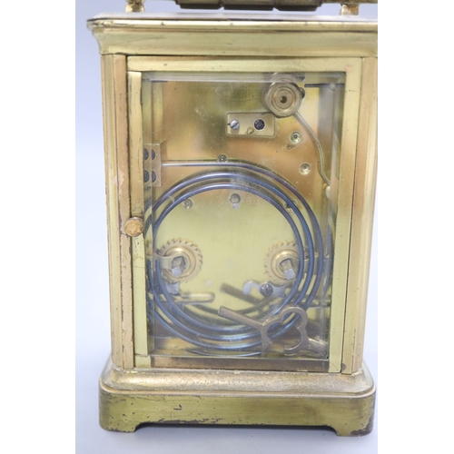 1212 - A brass cased hour repeating carriage clock