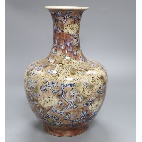 1222 - A Chinese underglaze blue and copper red 'dragon' crackleglaze vase, height 31.5cm