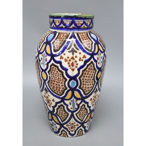 1228 - An early 20th century Isnik style pottery vase, height 34cm