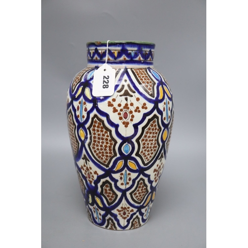 1228 - An early 20th century Isnik style pottery vase, height 34cm