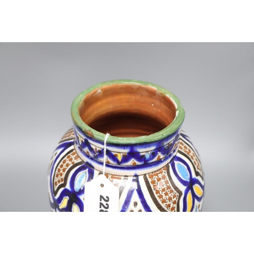 1228 - An early 20th century Isnik style pottery vase, height 34cm