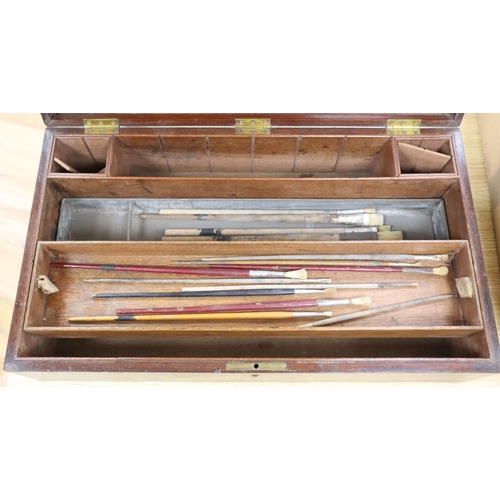 1247 - A 19th century mahogany artist's paint box including brushes