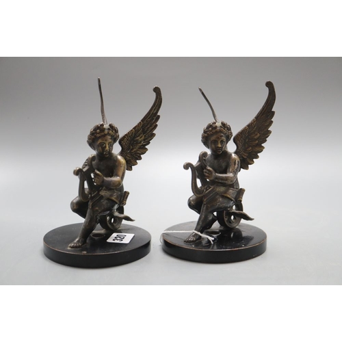 1320 - A pair of 19th century bronze cherub bookends, height 16cm