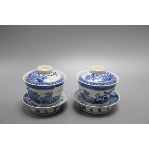 1321 - A pair of Chinese blue and white tea bowls with covers and stands, overall height 10cm