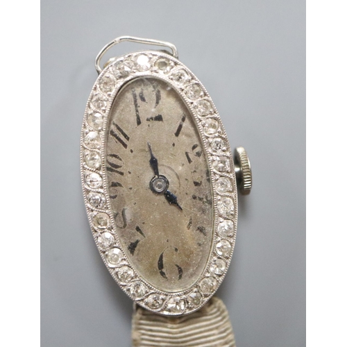 1733 - A ladies 1930's platinum and diamond cocktail watch head