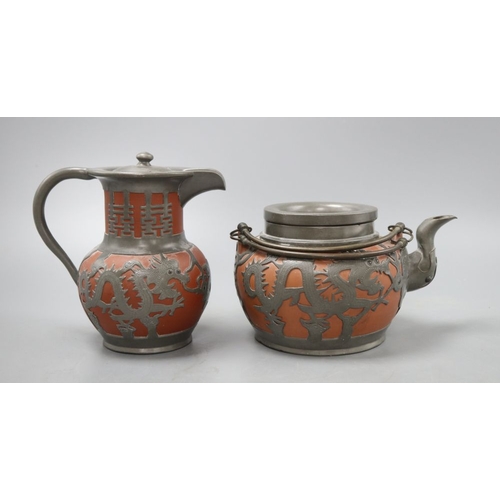 388 - A Chinese Yi Xing teapot and hot water pot, tallest 15cm