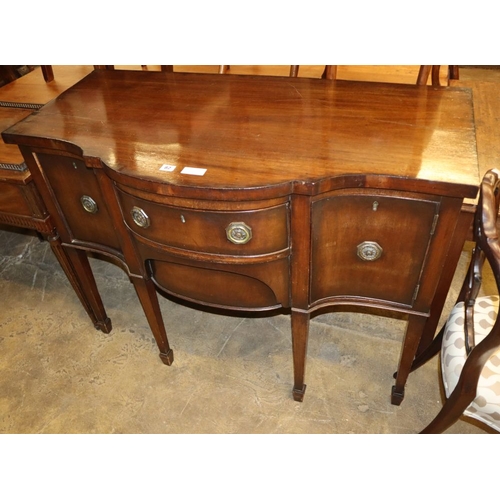 68 - A Georgian style mahogany serpentine sideboard, W.117cm