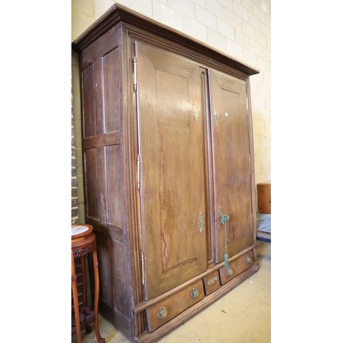 21 - An 18th century Normandy oak two door armoire with brass escutcheons and buttressed hinges, W.178cm,... 