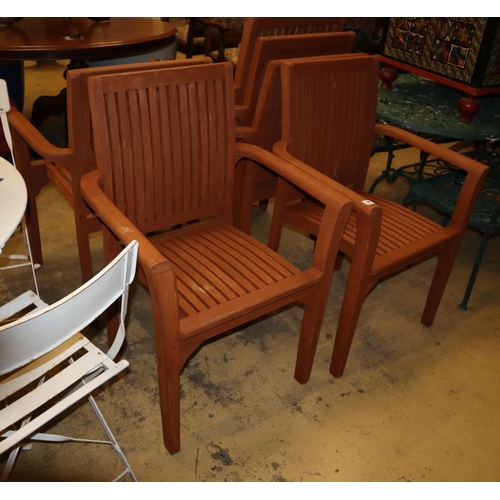 34 - A set of six stained teak garden elbow chair