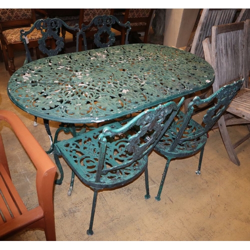 36 - A painted metal garden table, W.136cm, D.76cm, H.68cm, bench seat and two chairs