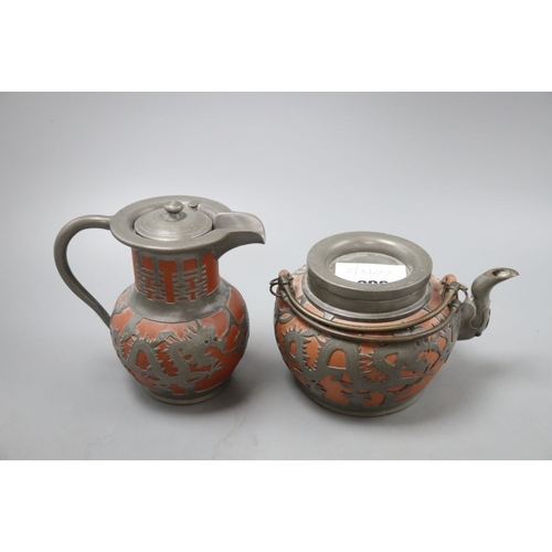 388 - A Chinese Yi Xing teapot and hot water pot, tallest 15cm