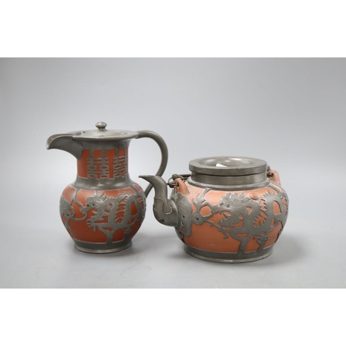 388 - A Chinese Yi Xing teapot and hot water pot, tallest 15cm