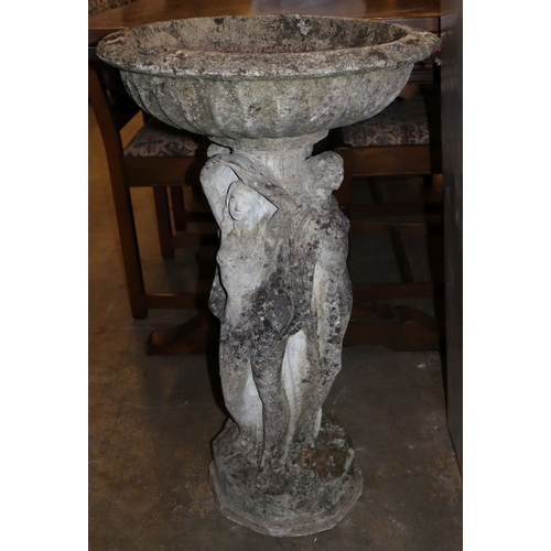 39 - A reconstituted stone garden bird bath, 48cm diameter, H.80cm