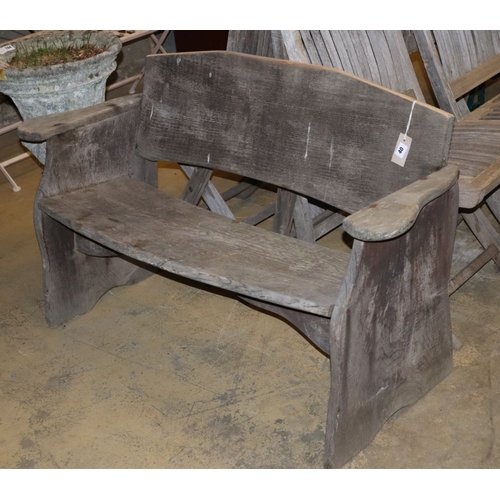 40 - A rustic wood garden bench, W.120cm, D.43cm, H.74cm