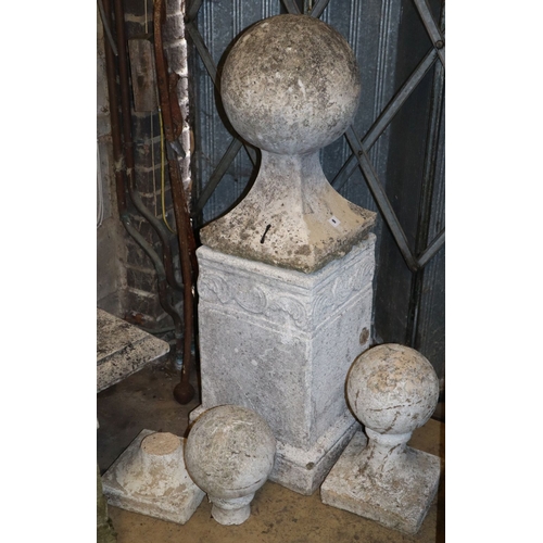 9 - Three reconstituted stone garden ball finials, (one on pedestal) H.104cm