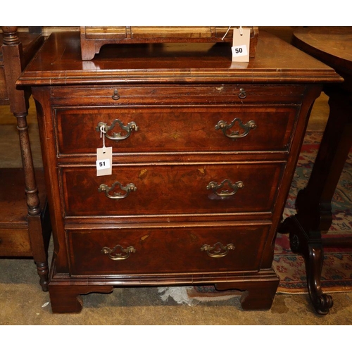 51 - A 19th century style walnut chest with brushing slide and three drawers, Width 66cm