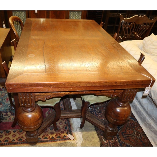 54 - An 18th century-style, Dutch design oak draw leaf dining table, 135 x 90cm