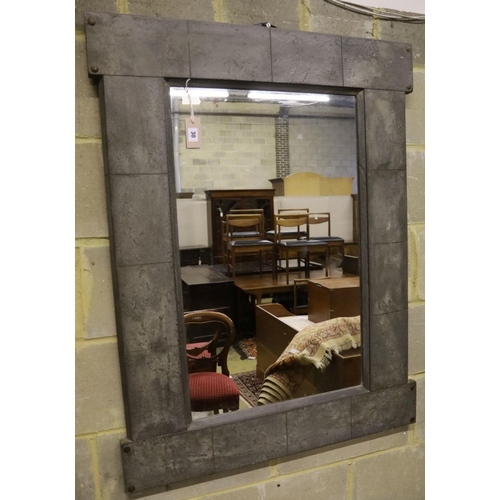 30 - A rectangular pewter framed wall mirror, 64 x 110cm