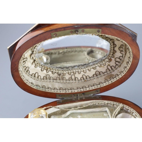 11 - A late 18th century Dutch brass bound kingwood necessaire, with gilt brass mounts, the lid opening t... 