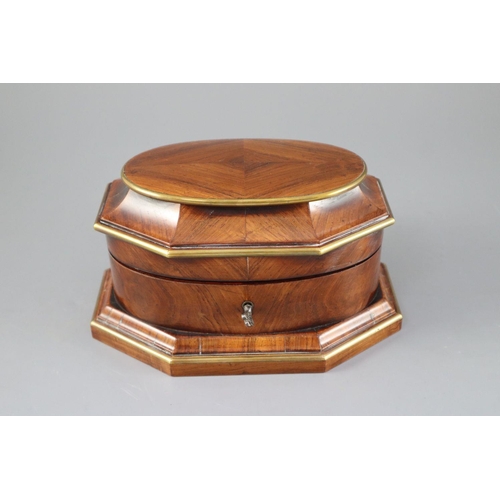 11 - A late 18th century Dutch brass bound kingwood necessaire, with gilt brass mounts, the lid opening t... 