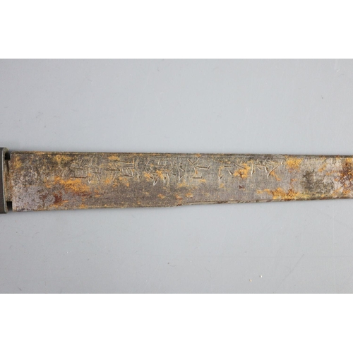 19 - A fine Japanese 'sea creatures' tanto, Meiji period, the saya lacquered to simulate wood grain and g... 