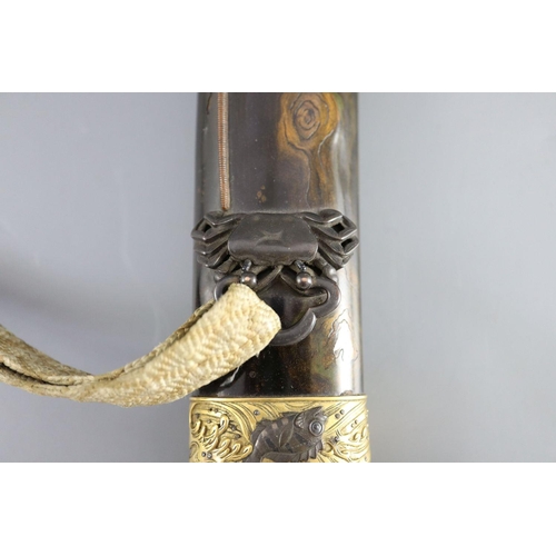 19 - A fine Japanese 'sea creatures' tanto, Meiji period, the saya lacquered to simulate wood grain and g... 