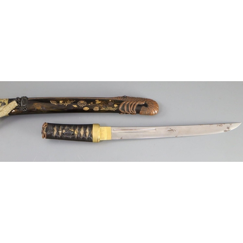 19 - A fine Japanese 'sea creatures' tanto, Meiji period, the saya lacquered to simulate wood grain and g... 