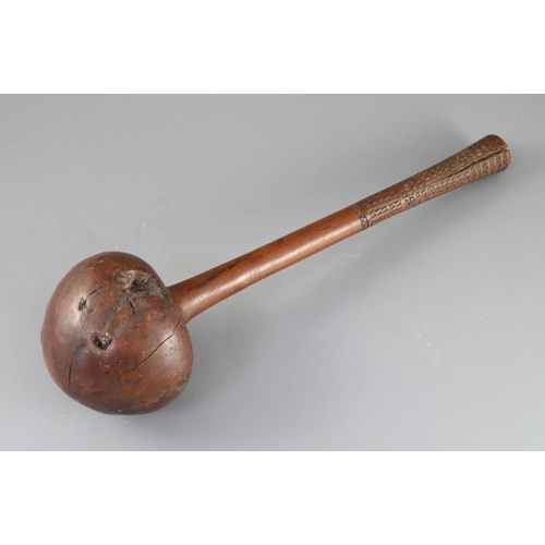 21 - A 19th century Fijian Ula throwing club, with geometric carved handle, length 15.75in. diameter 4.25... 