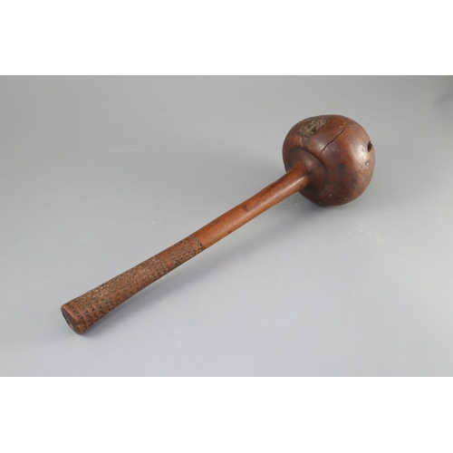21 - A 19th century Fijian Ula throwing club, with geometric carved handle, length 15.75in. diameter 4.25... 