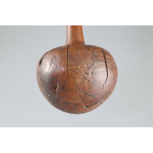 21 - A 19th century Fijian Ula throwing club, with geometric carved handle, length 15.75in. diameter 4.25... 