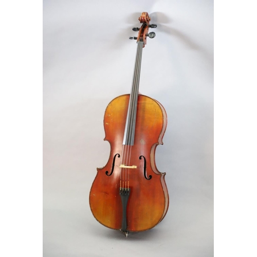31 - A late 19th/early 20th century German cello, labelled 'Schutz HD junior Marke', with little curl to ... 