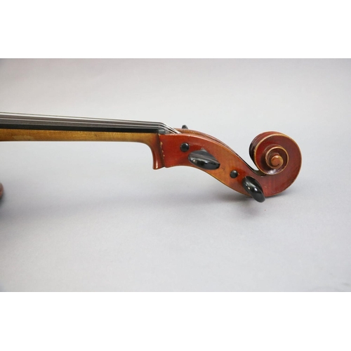 31 - A late 19th/early 20th century German cello, labelled 'Schutz HD junior Marke', with little curl to ... 