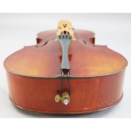 31 - A late 19th/early 20th century German cello, labelled 'Schutz HD junior Marke', with little curl to ... 