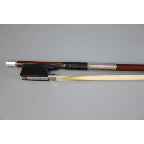 32 - A late 19th/early 20th century silver mounted bow, unmarked, 74cm long