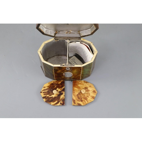46 - A George III silver mounted green stained tortoiseshell and ivory tea caddy, of decagonal form, with... 