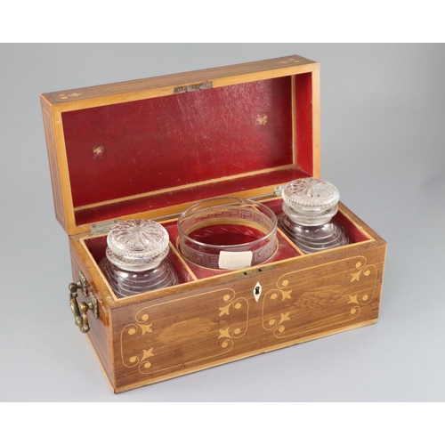 47 - A Regency inlaid mahogany tea caddy, of plain rectangular form, with gilt bronze handles, the lid en... 