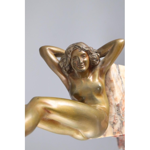 55 - Claire Jeanne Roberte Colinet (1880–1950) - an Art Deco patinated bronze figure of a naked hoop danc... 