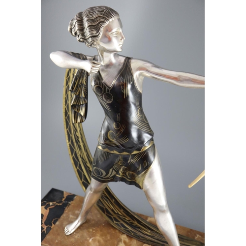 59 - Lucien Gibert (1904-1988) - an Art Deco silvered spelter figure of a female archer, standing with iv... 