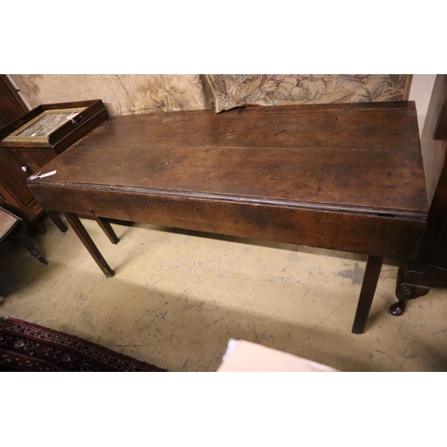 5 - An 18th century provincial oak drop flap dining table, width 155cm, depth 66cm, height 71cm... 