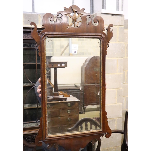 55 - A George III style mahogany fret frame wall mirror, width 52cm, 93cm high