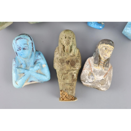 10 - Five Egyptian turquoise glazed faience shabti and three fragments, New Kingdom to late period, some ... 